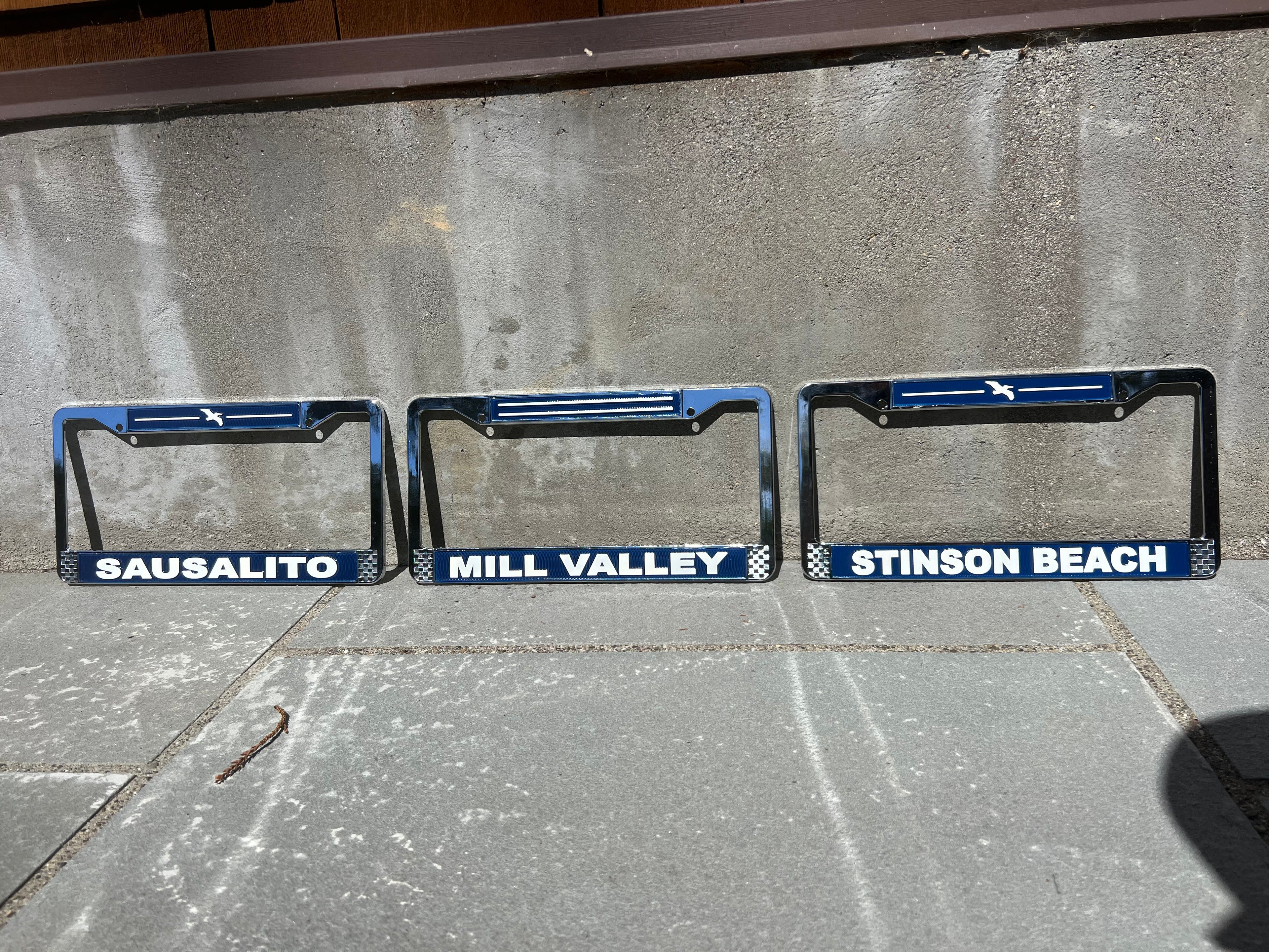 Lowkey Local license plate frames 'SAUSALITO', 'MILL VALLEY', and 'STINSON BEACH' all to celebrate where you live and love