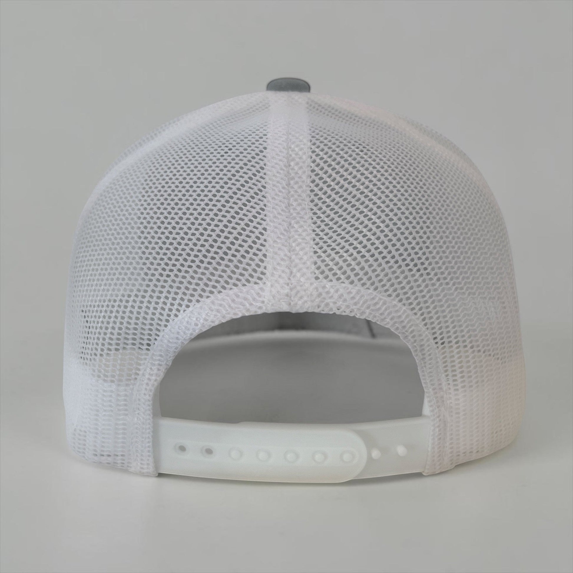 Lowkey Local Mill Valley trucker hat featuring a white mesh back and adjustable snapback closure
